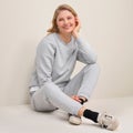 NICOLA collegehousut, vaalea meleerattu harmaa